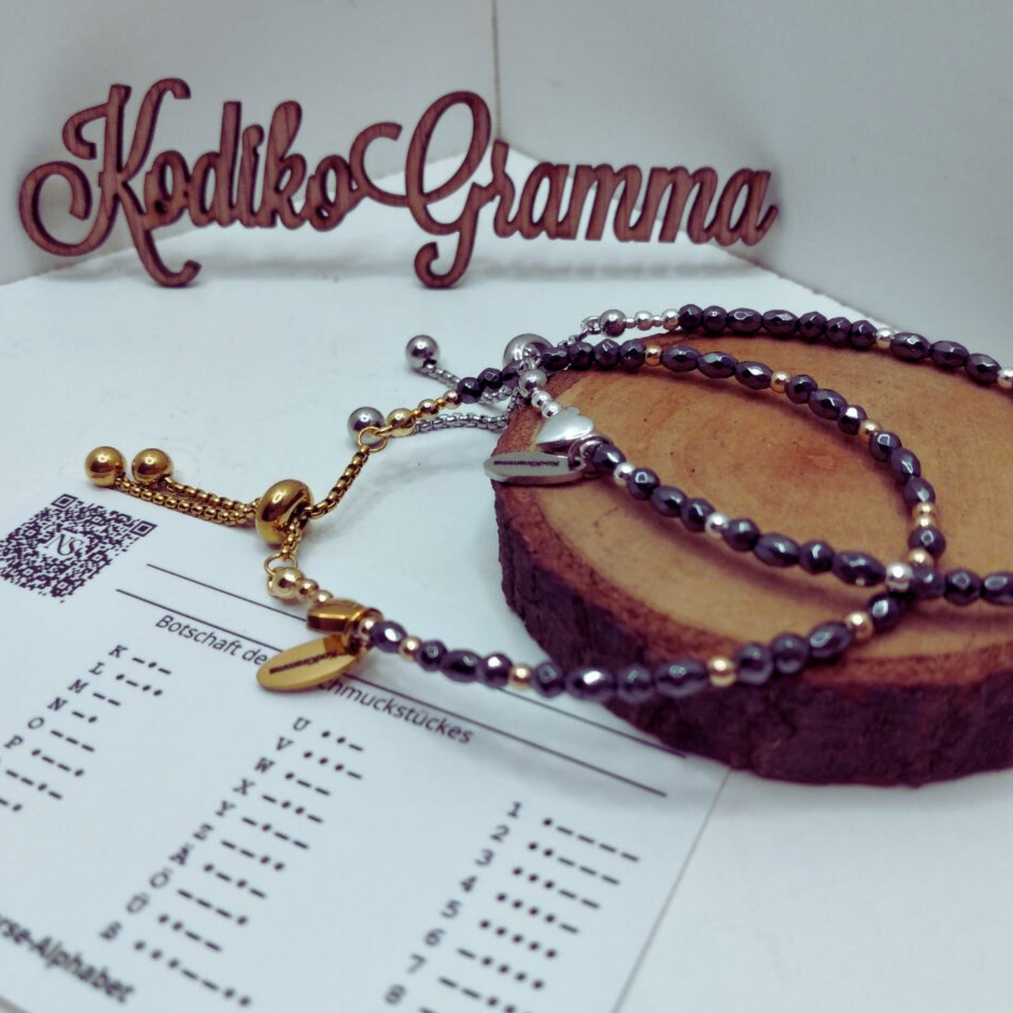 Entdecke das handgemachte Armband „Träume groß“ mit Morsecode. Verstellbarer Edelstahlverschluss, Geschenkbox, motivierende Botschaft.