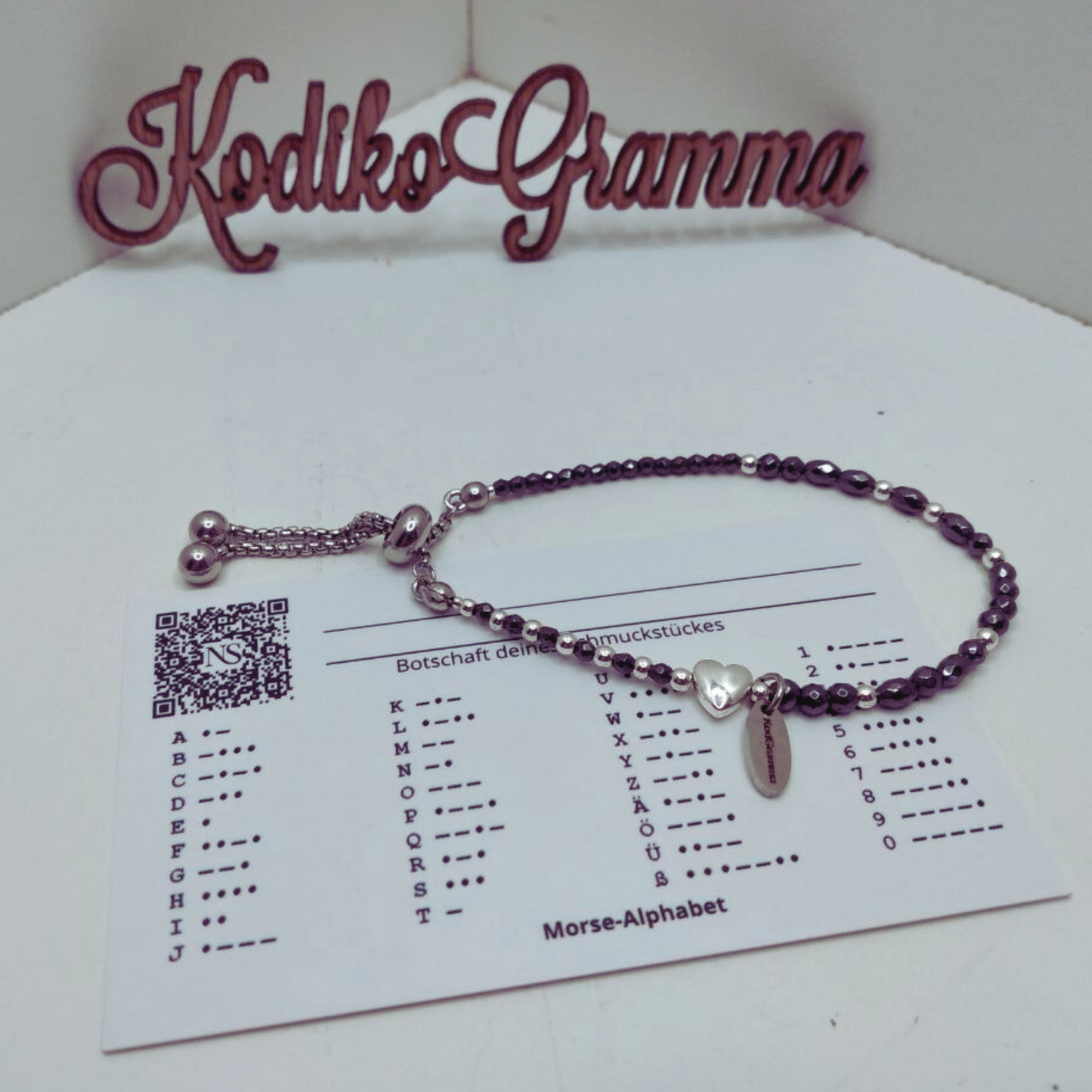 Ein Morsecode-Armband mit dem Wort „Schatz“. Verstellbarer Edelstahlverschluss, Geschenkverpackung. Handgemacht & einzigartig.