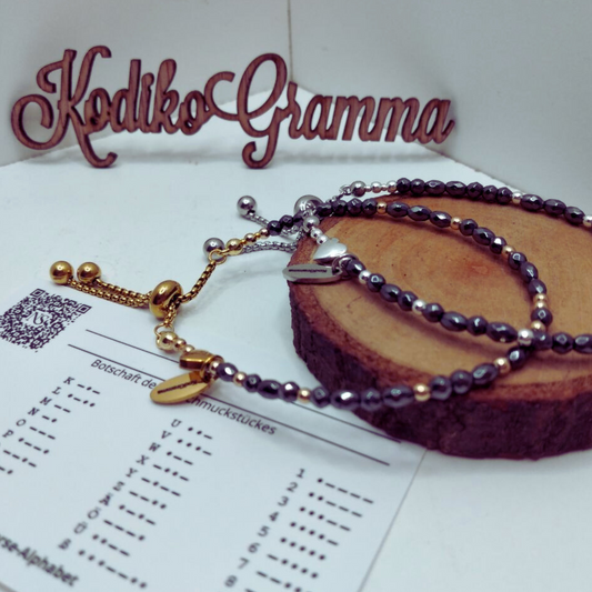 Entdecke das handgemachte Armband „Träume groß“ mit Morsecode. Verstellbarer Edelstahlverschluss, Geschenkbox, motivierende Botschaft.