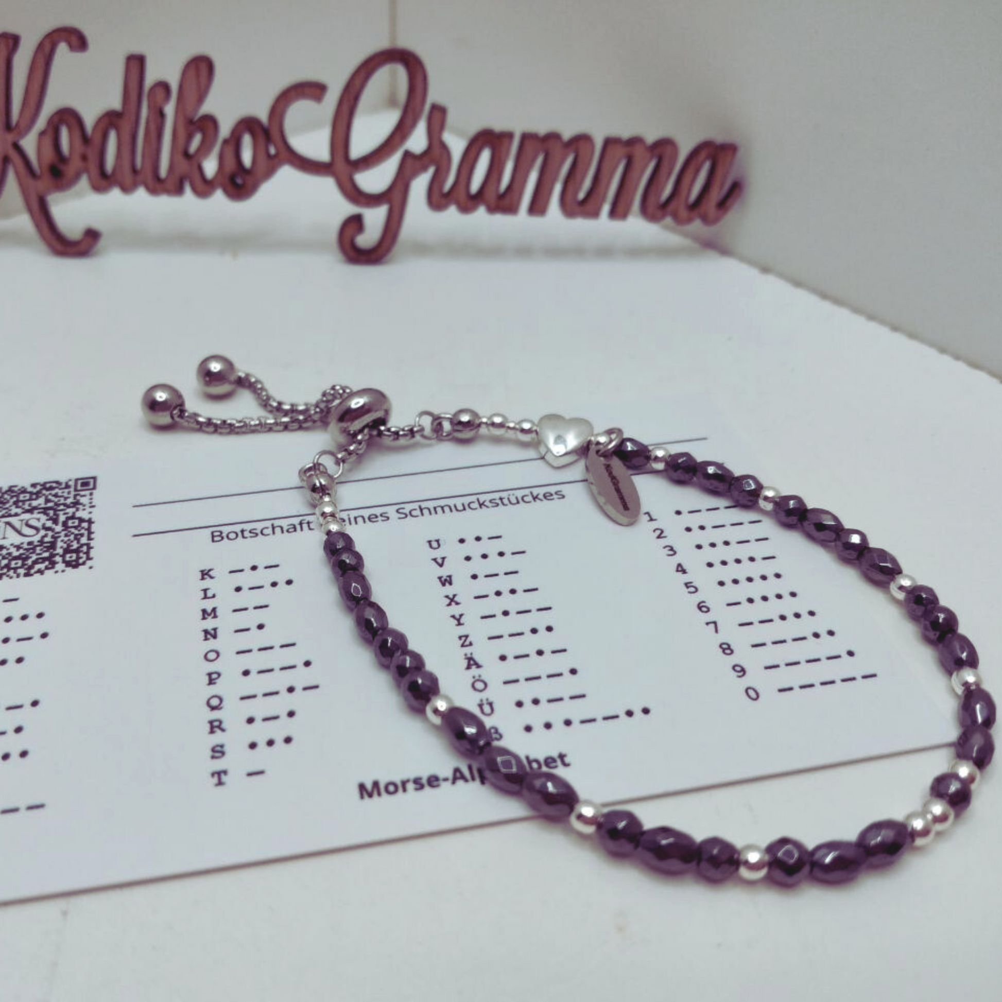 Entdecke das handgemachte Armband „Träume groß“ mit Morsecode. Verstellbarer Edelstahlverschluss, Geschenkbox, motivierende Botschaft.